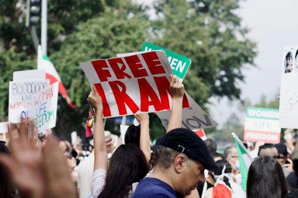 a group of people holding signs