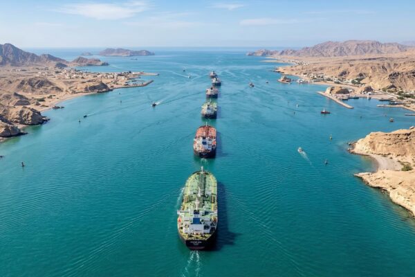Oil tankers sailing through Strait of Hormuz aerial view