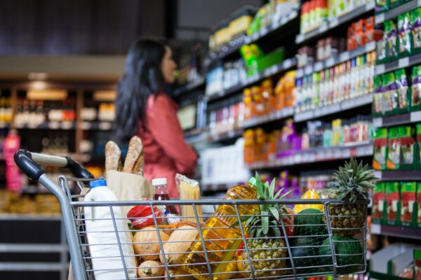 Various groceries in shopping cart