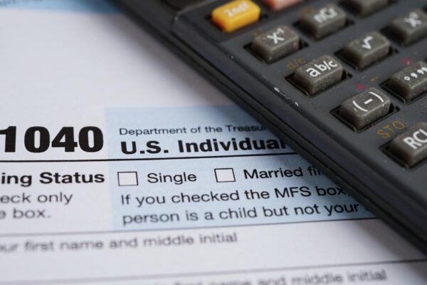 Tax form 1040 US Individual Income Tax Return business finance concept