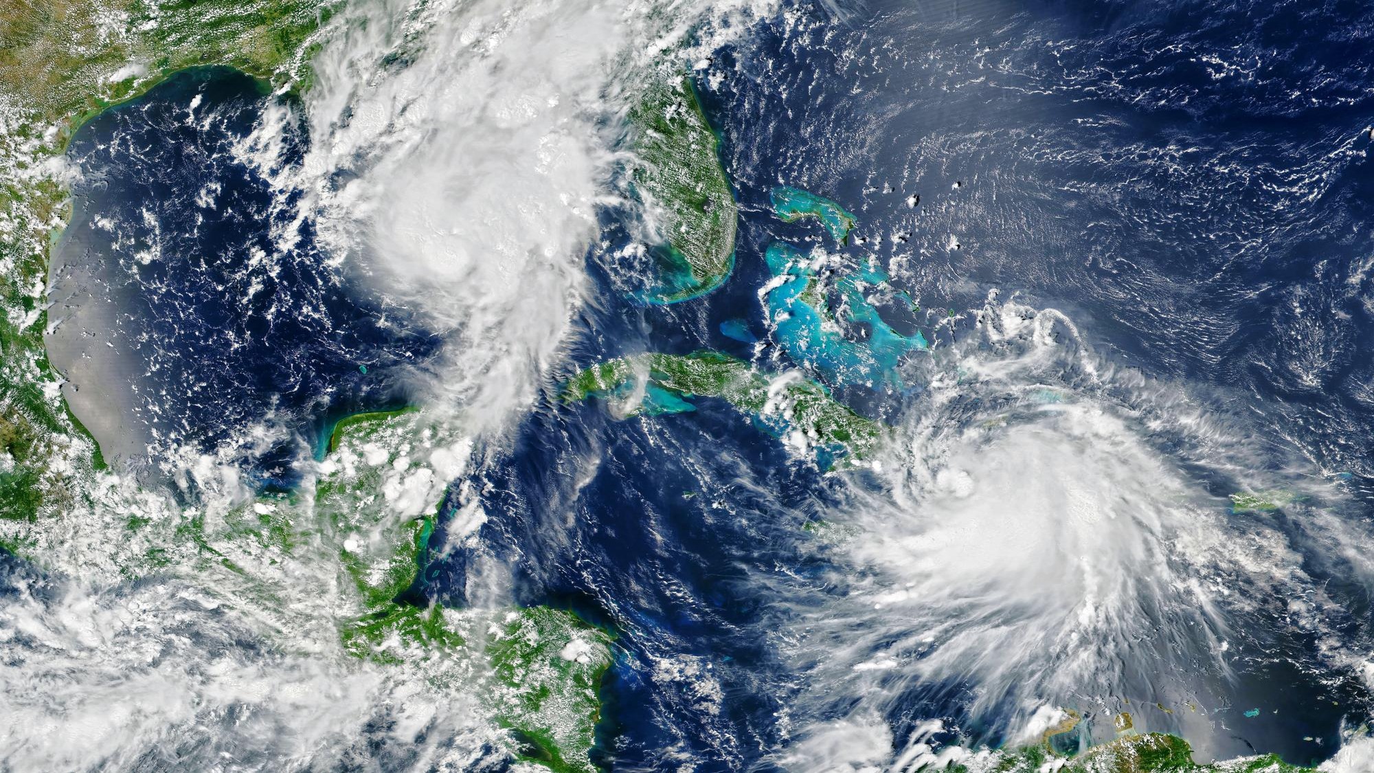 Laura and Marco storms are approaching USA view of two tropical hurricanes from space Elements of this image furnished by NASA