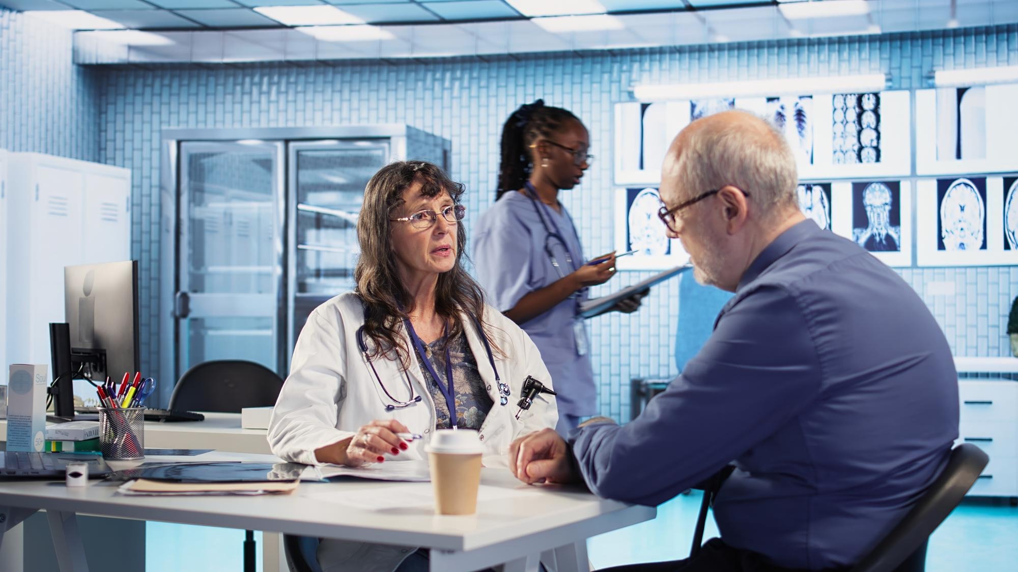 Female doctor in a clinic evaluates a man cognitive function and reflex