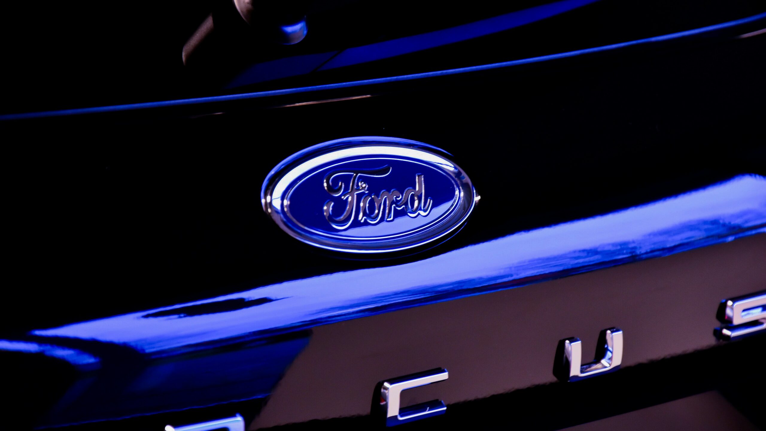 blue and silver ford logo