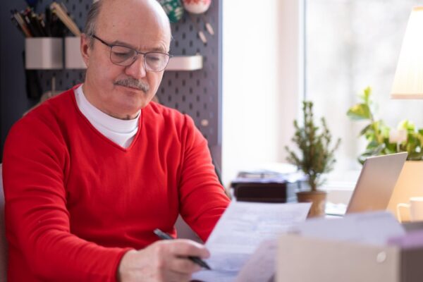Depressed senior man feel worry about financial problem.