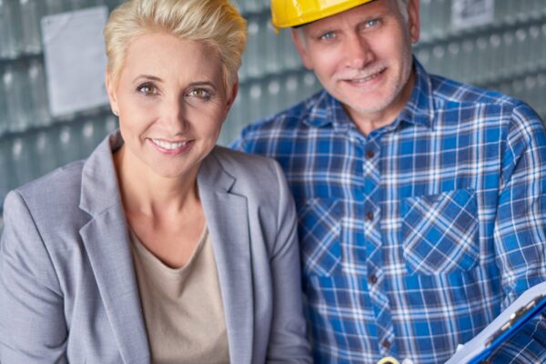 Two people working in warehouse