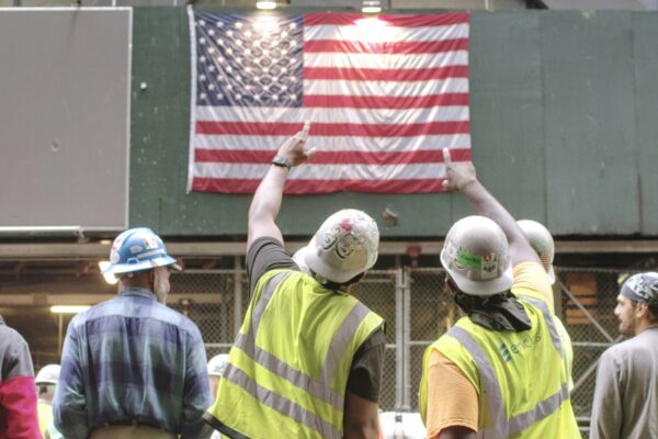 group of men in yellow hard hat and yellow hard hat