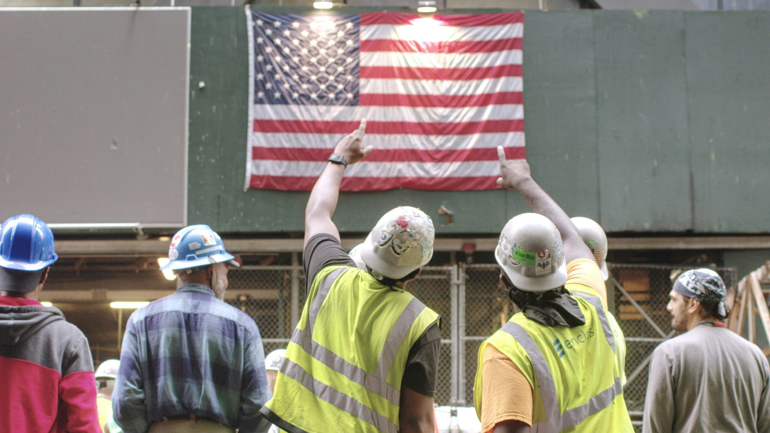 group of men in yellow hard hat and yellow hard hat