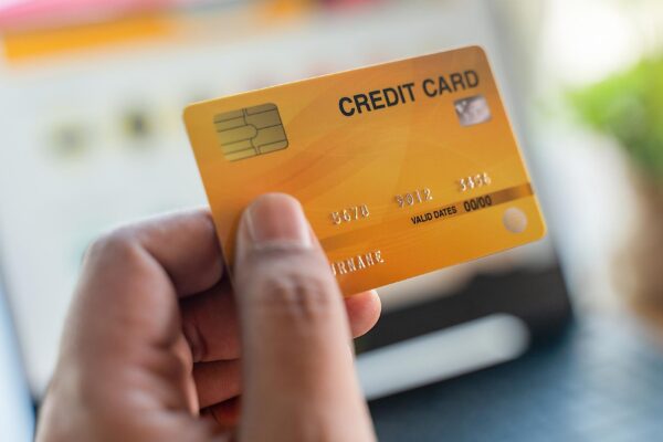 Close-up of hand holding credit card