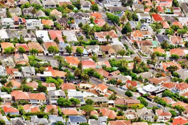 High angle view of houses and buildings in town