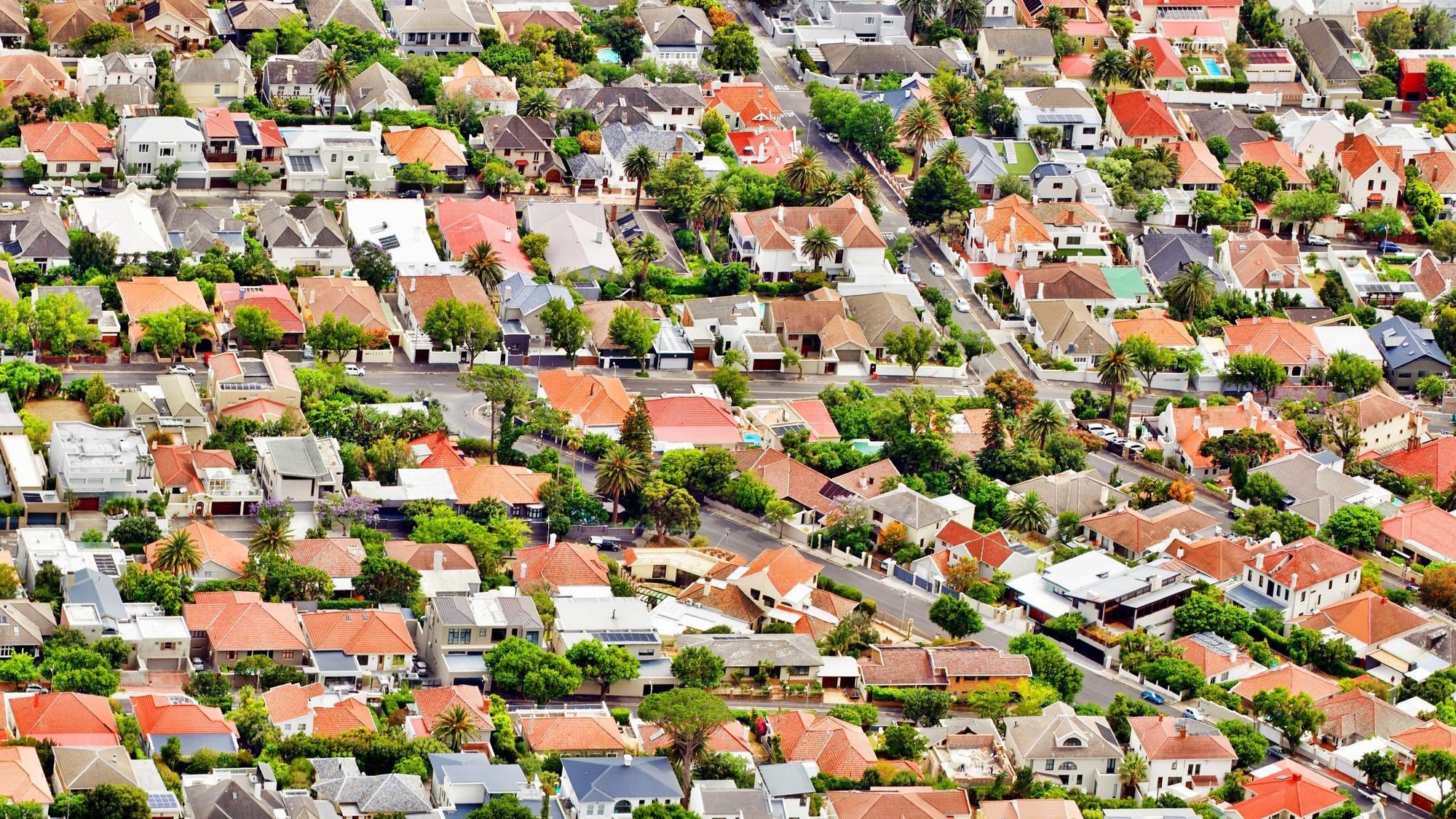 High angle view of houses and buildings in town