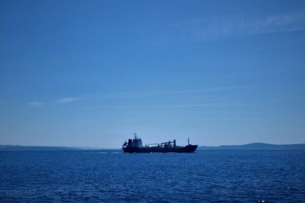 a large ship sailing across a large body of water