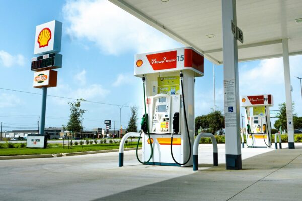 A gas station with a few gas pumps