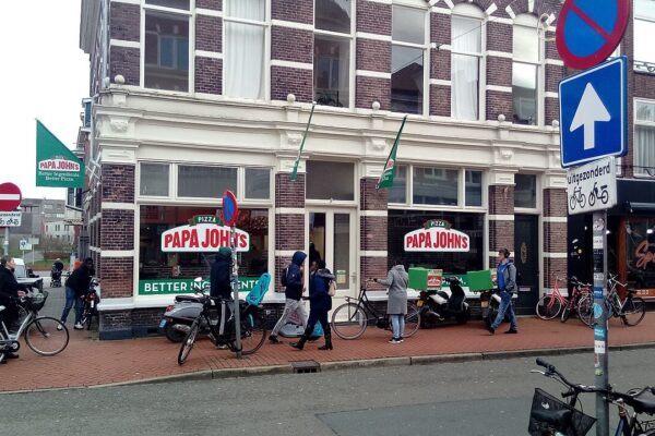 A small local Papa John's Pizza-branded restaurant in the Groninger capital city of Groningen.