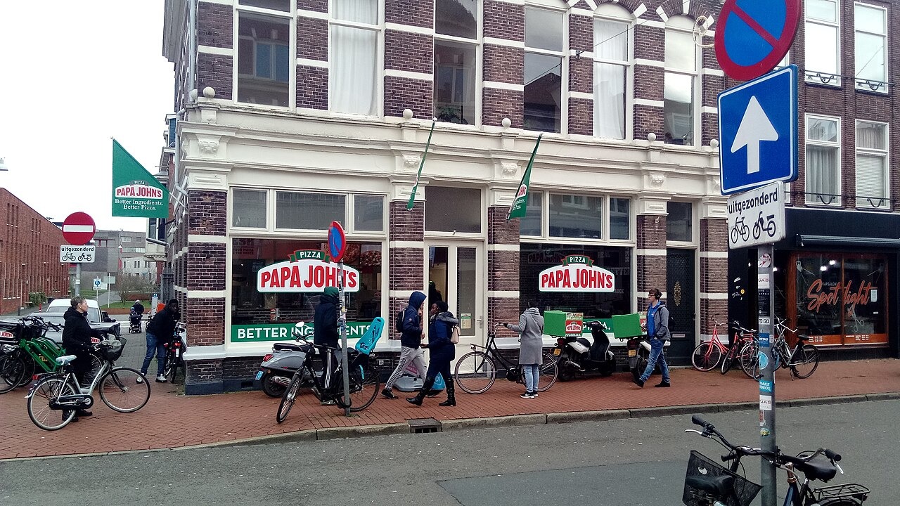 A small local Papa John's Pizza-branded restaurant in the Groninger capital city of Groningen.