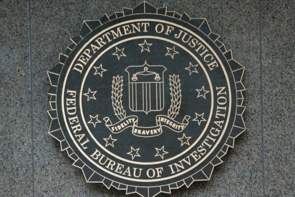 the seal of the department of justice on a wall