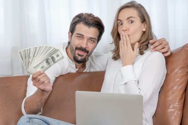 Portrait businessman and business woman using the computer laptop at home office