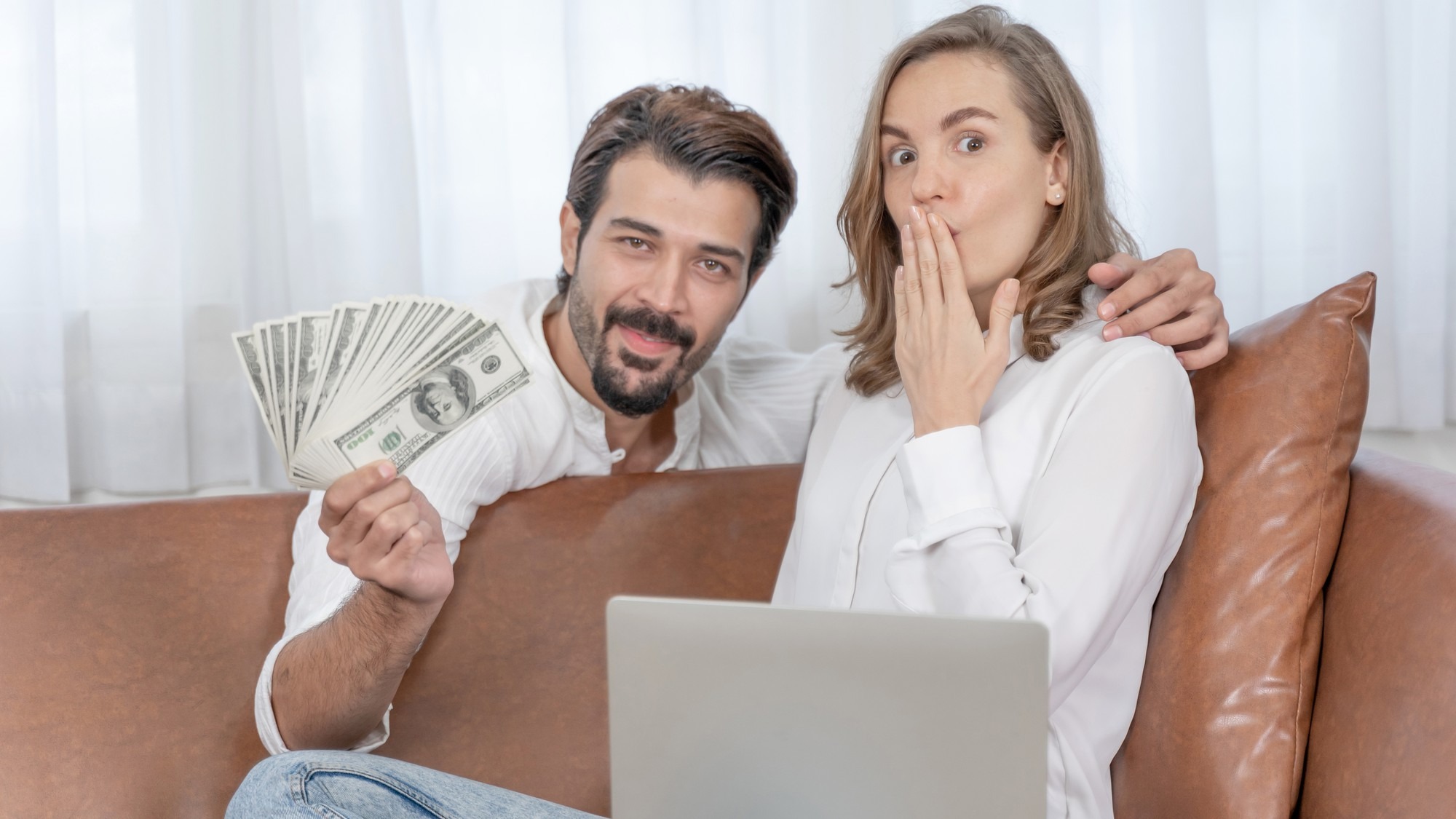 Portrait businessman and business woman using the computer laptop at home office