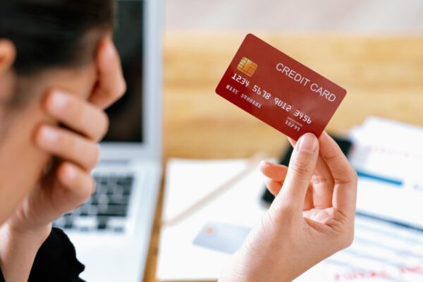 Stressed young woman has financial problems credit card debt to pay uttermost