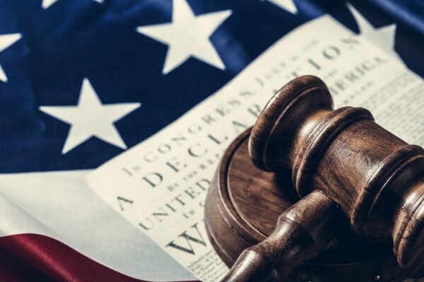 Wooden gavel and USA flag