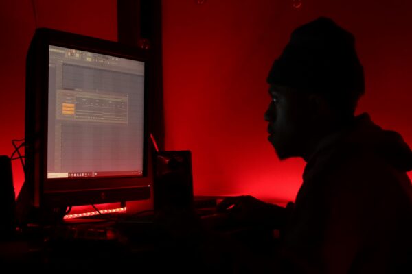 man in front of monitor