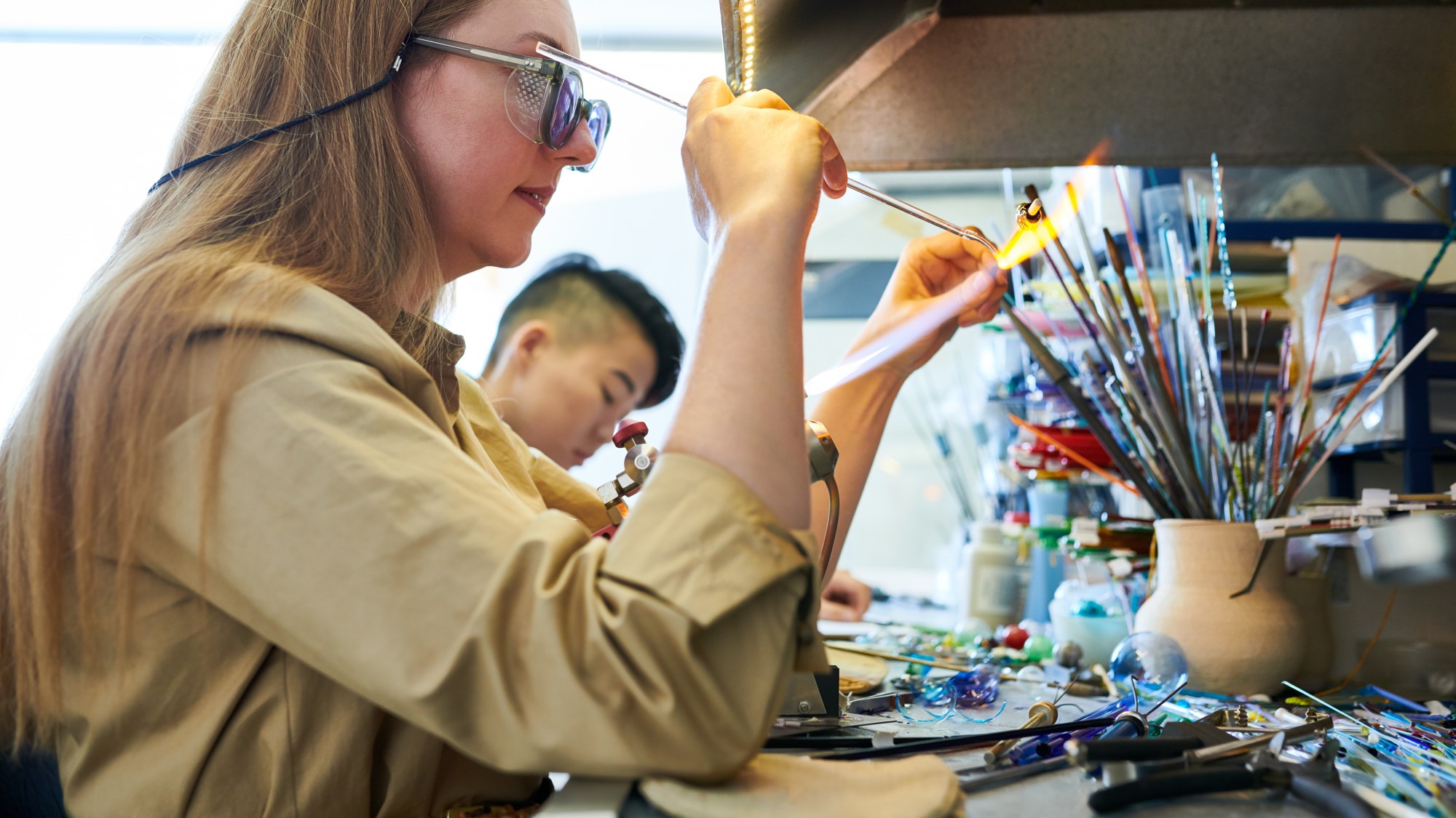 Artist Shaping Glass in Flame