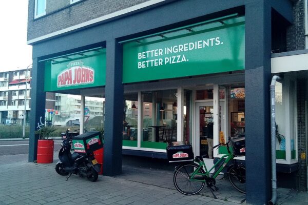 A small local Papa John's Pizza-branded restaurant, that is located in the Haaglander city of Delft, South Holland.