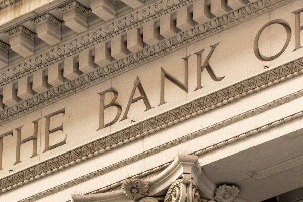The bank of ornate classical columns and facade