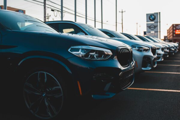a row of cars parked in a parking lot