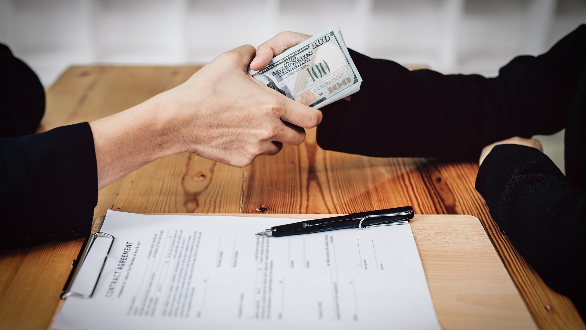 Corrupt concept corrupt private entrepreneurs are handing over money to government employees to offer to sign contracts that benefit their company