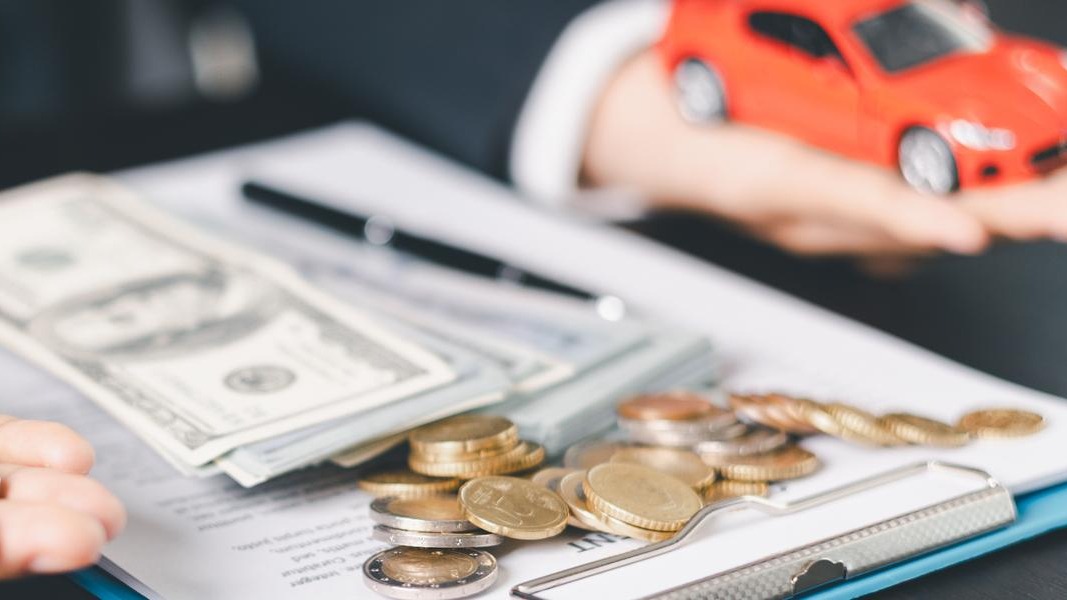 Concept business vehicle finance protection office plan investment buy sell car ensuring idea financial security automobile agent hand protect purchase insurance and loan deal banner with copy space