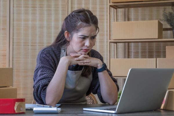 Small business startup sme owner entrepreneurs asian woman with unsuccess business online shopping