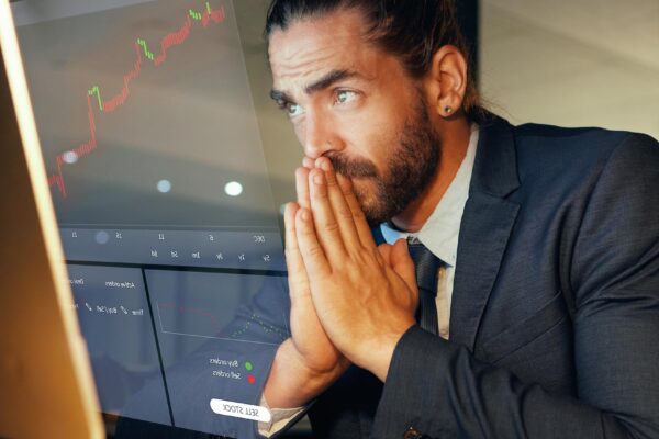 Business man stock market or money investment while waiting for the price to rise Economy fintech and wealth of rich entrepreneur and growth of cash crypto or stocks or bitcoin bonds or trading