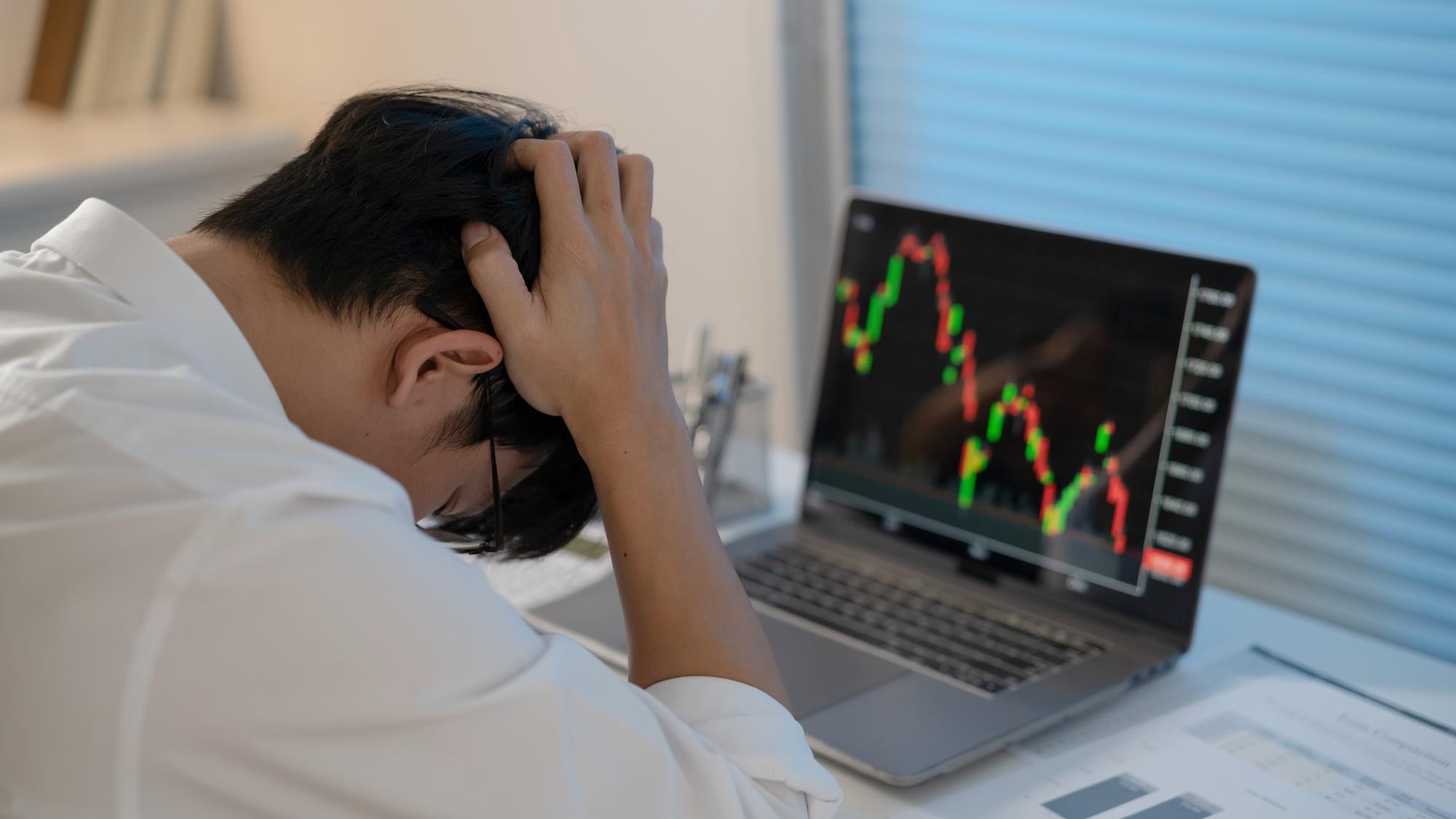 Asian businessman In the Data Mining Center Statistician with Monitors Displaying business finance technology and investment Stock Market Investments