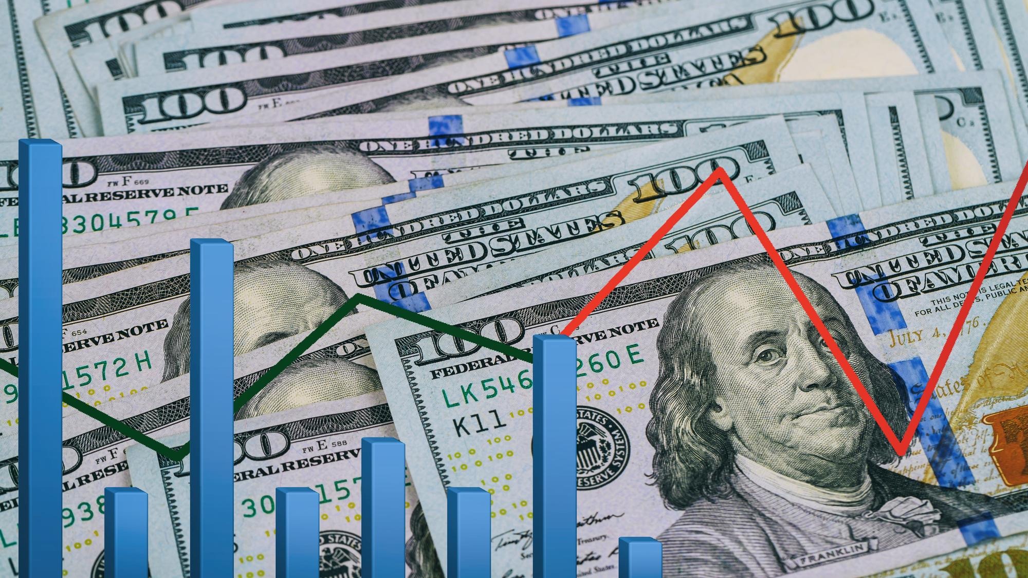 Close-up of money with graph