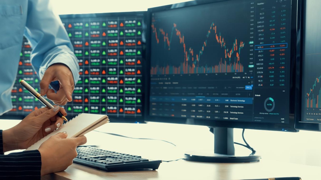 A cropped closeup image of professional smart trader hand pointing at financial growth graph while write data analysis in notebook Business finance and Stock market investment concept Burgeoning