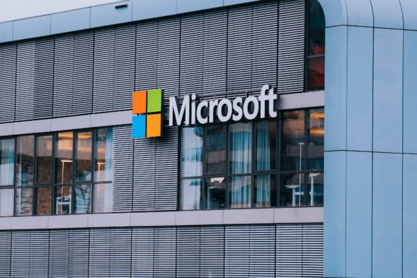 A tall building with a microsoft logo on it