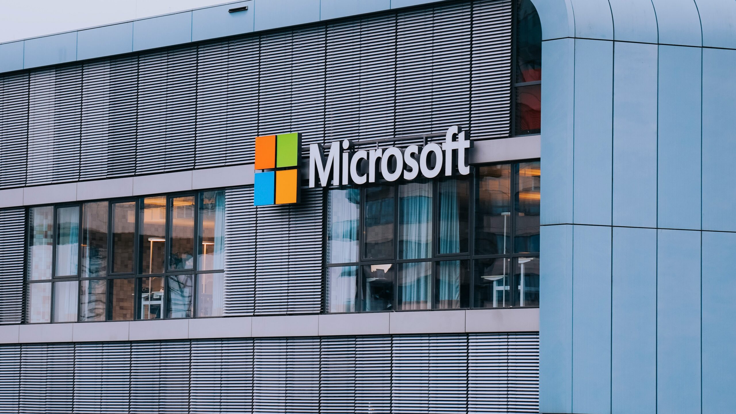 A tall building with a microsoft logo on it