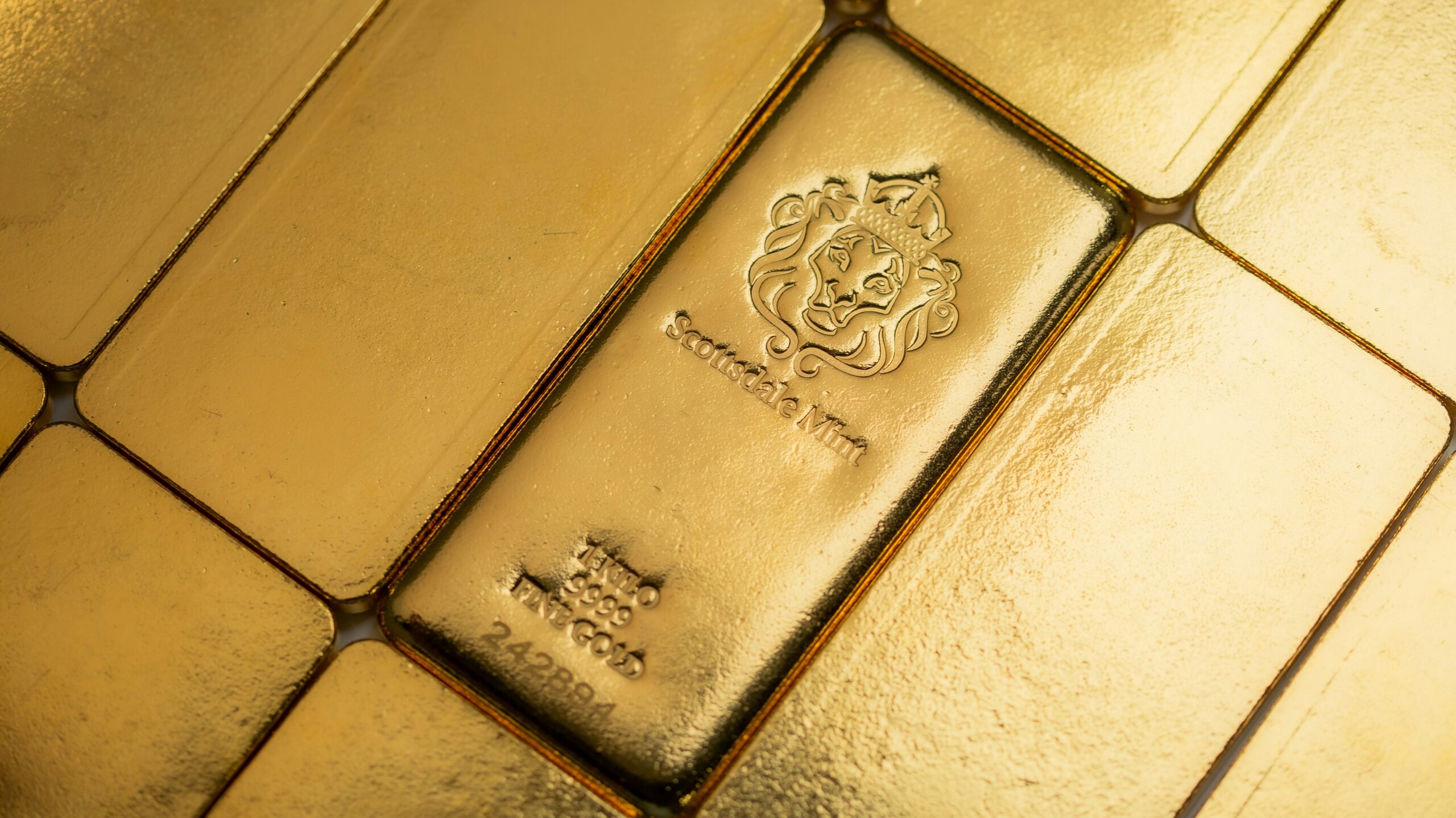 A close up of some gold bars on a table