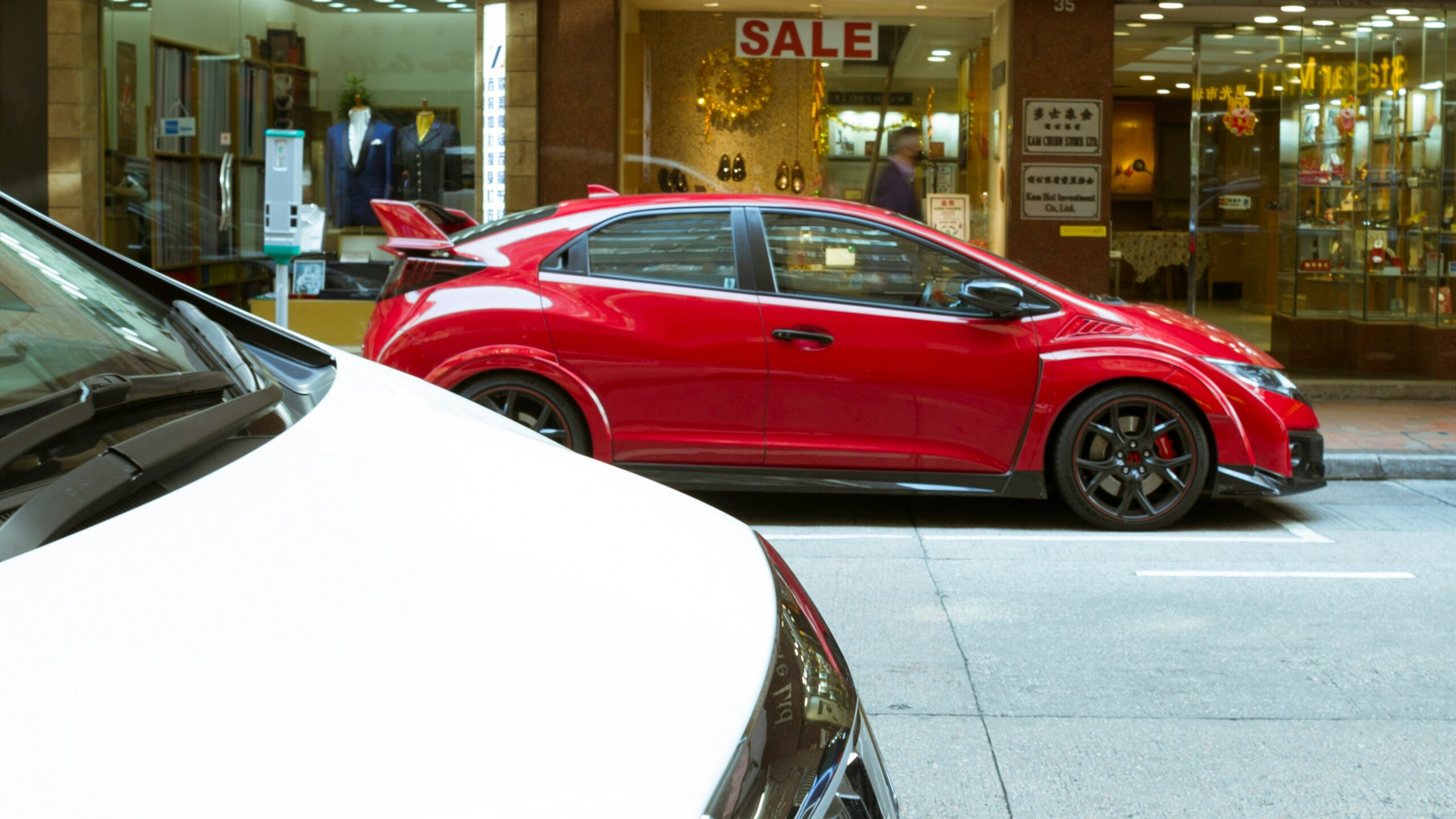a car parked on the side of a building