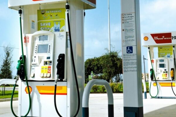 A gas station with a few gas pumps