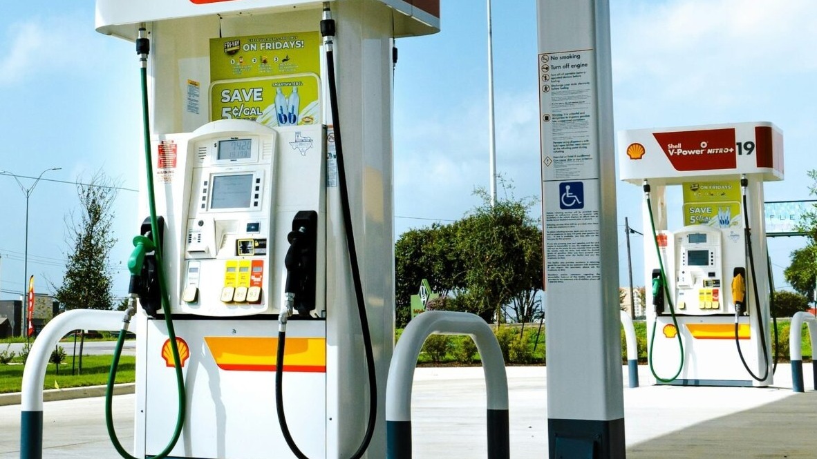 A gas station with a few gas pumps