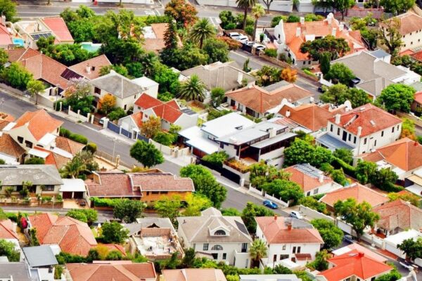 High angle view of houses and buildings in town