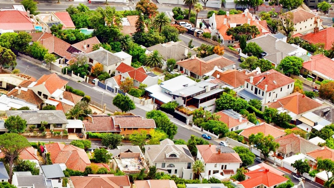 High angle view of houses and buildings in town