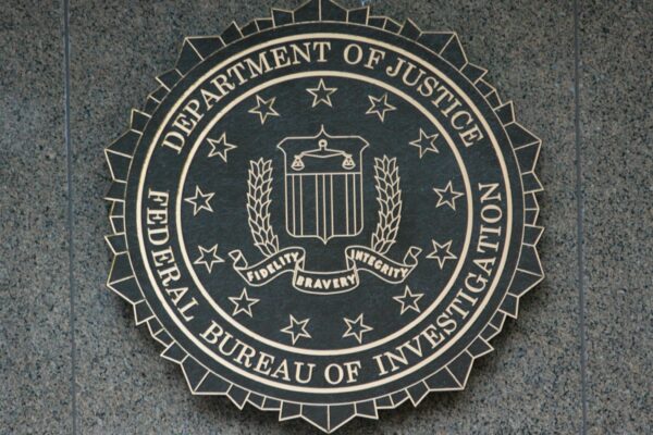 the seal of the department of justice on a wall