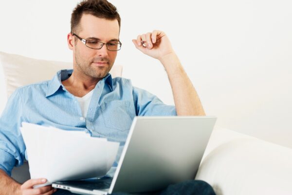 Man working at home with laptop