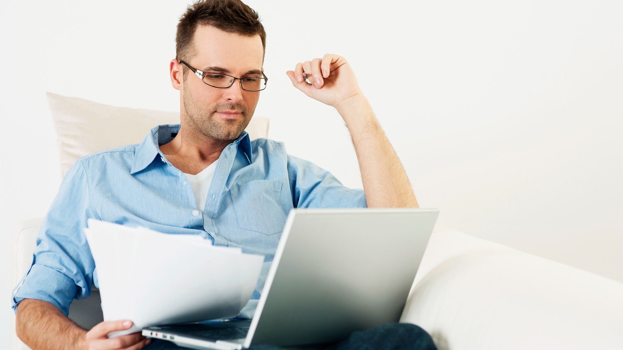 Man working at home with laptop