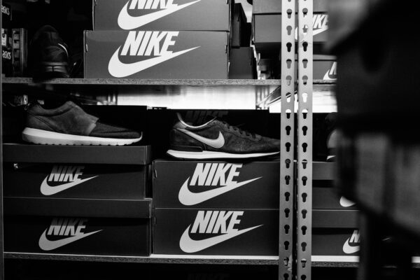 a black and white photo of a pair of nike shoes