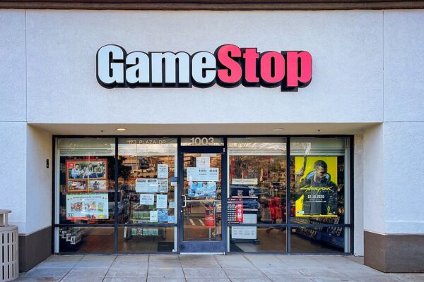 A GameStop retail store location in Vallejo, California. GameStop sells PC and console games, accessories, and merchandise. In 2021, GameStop's stock (GME on the New York Stock Exchange) was the subject of a massive "short squeeze", where retail investors from Reddit's "WallStreetBets" subreddit caused interest in the stock to surge, putting pressure on large Wall Street hedge funds who were betting on the stock to go down, and creating controversy around the Robinhood retail brokerage app.