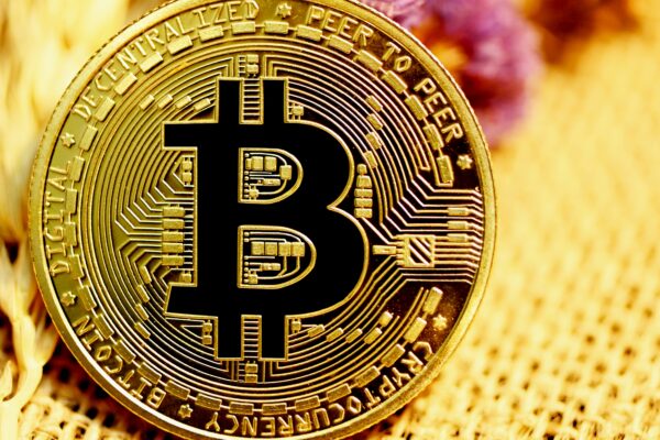 gold and black round coin