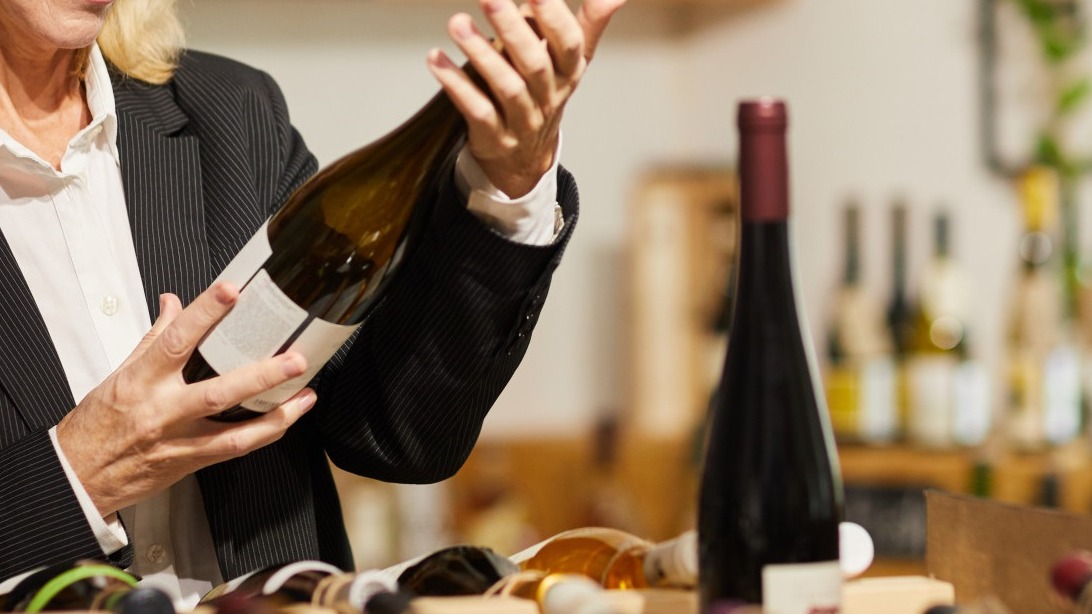 Female Sommelier Choosing Wine